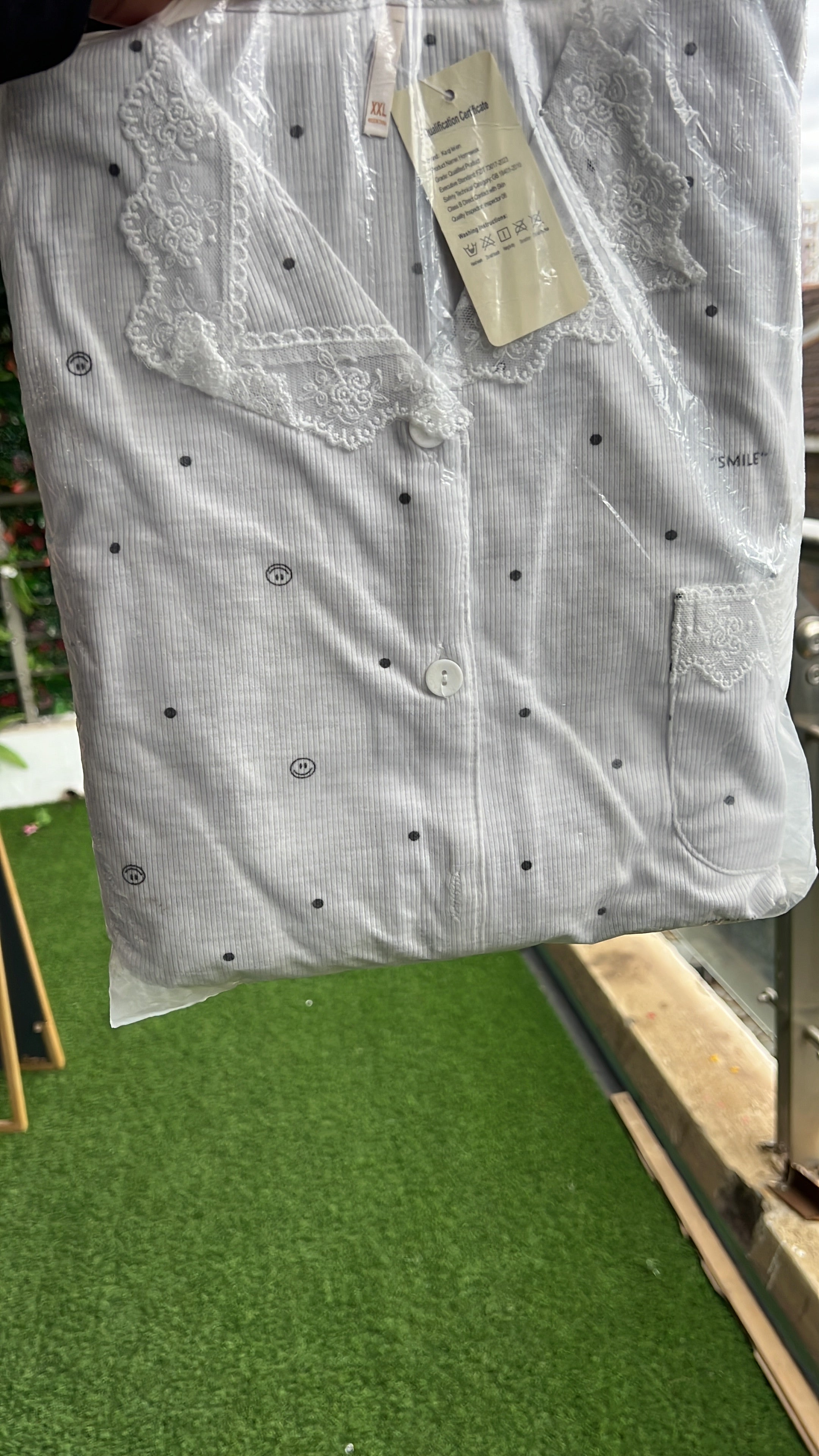 Grey with black dots